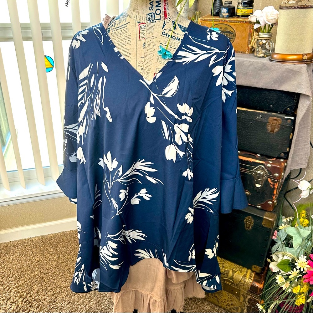NWT-BloomChic Lightweight V-Neck Shark bite Top. Beautiful Blue & White.
